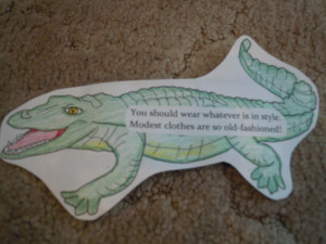 ... (underlined). On the back of the crocodile glue the related quote
