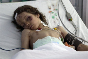 Crash survivor Ruben van Assouw is seen in his hospital bed in Tripoli ...