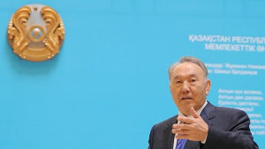 Kazakh President Nursultan Nazarbayev casts his ballot at a polling ...