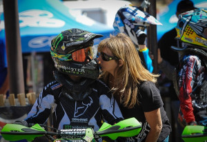 ... , CA gets a good luck kiss from his mom before the start of moto two