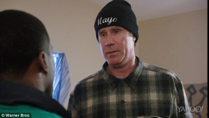 Getting into it: James sports a beanie emblazoned with his gang name ...