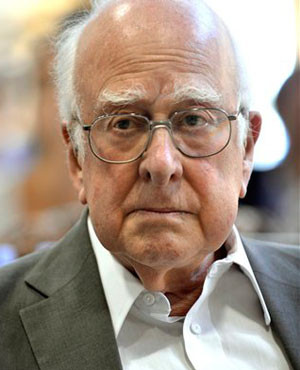 British physicist Peter Higgs listens to journalist 39 s questions ...