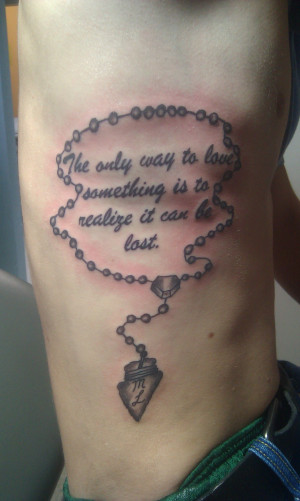 Rosary and arrow head tattoo with quote