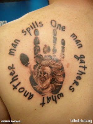 Jerry Garcia tatoo with quote and his famous hand print