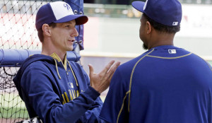 Brewers Manager Craig Counsell talks to catcher Martin Maldonado ...
