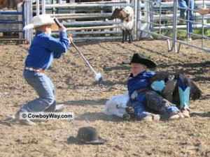 this photo was taken during the calf branding event the mounted roper ...