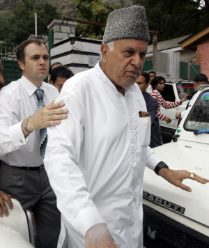 Omar Abdullah escorting his dad Farooq Abdullah Reuters