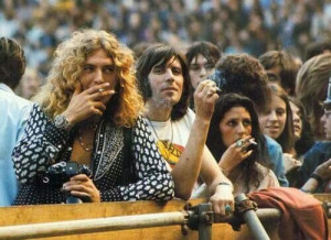 Robert Plant and wife (at the time Maureen) to the right also smoking.