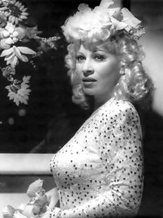 Mae West by George Hurrell, 1944. (I love how in this pic she's not ...