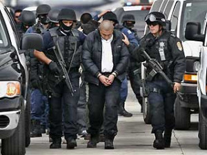 ... Accused of Working for Drug Cartel Flown to Capital for Prosecution