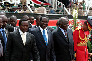 President Mwai Kibaki (right) with Prime Minister Raila Odinga and ...