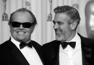 Presenter Jack Nicholson (L) and George Clooney pose in the press room ...