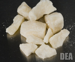 This line has two meanings. Cocaine is literally a painkiller, as well ...