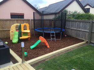 Timber border for a play area