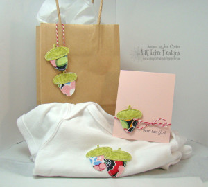 made a baby gift set using the acorns cut out of fabric. It looks so ...
