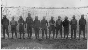 Football team of British soldiers with gas masks, Western front, 1916