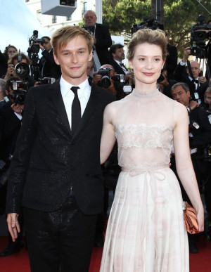 Actor Henry Hopper (L) and actress Mia Wasikowska attend 