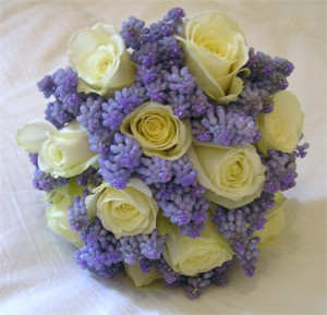 Handtied bouquet of avalanche roses and grape hyacinths