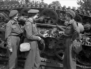 ... Canadian Army Medical Corps (R.C.A.M.C.) examining the wreckage of a