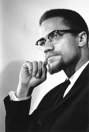 Malcolm X: Malcolm X poses for an iconic portrait, being remembered ...