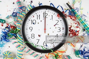 Royalty-free Image: Clock showing midnight surrounded by confetti and ...