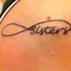 Matching sister tattoos