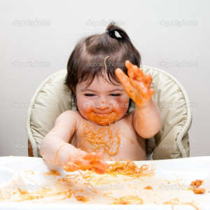 Happy Baby Having Fun Eating Messy Slapping Hands Covered Spaghetti