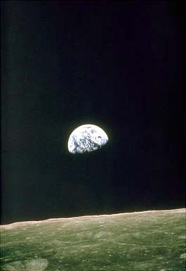 The rising Earth greets Apollo 8 astronauts as they come from behind ...