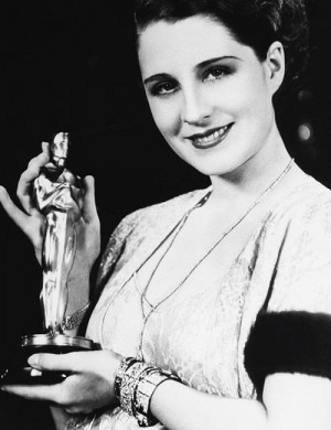 Shearer at the 3rd Annual Academy Awards in 1930 holding her Oscar ...