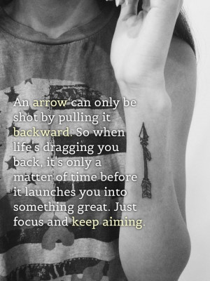 Arrow quote wrist tattoo