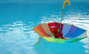 boat, elmo, floating, pool, rainbow, sesame street, umbrella, water