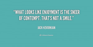 What looks like enjoyment is the sneer of contempt. That's not a smile ...