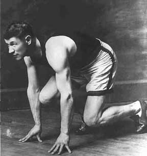 Jim Thorpe in position to sprint