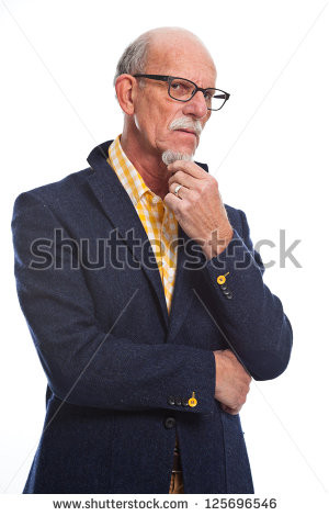 Serious well dressed senior man with glasses. Isolated. - stock photo