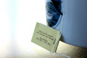 Happiness is a quote on the end of my tea bag. . .