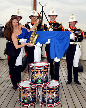 Amy Dickson with band-members from the Royal Marines. photo: LD ...