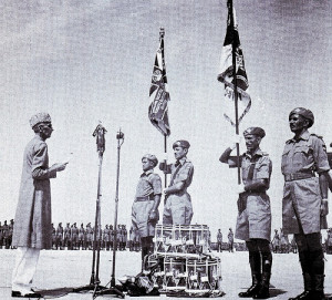 ... Azam presenting the National Standard to a regiment, Peshawar 1948
