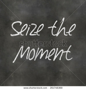 ... showing Seize the Moment written on a Blackboard - stock photo