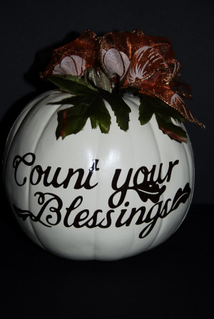 plastic resin pumpkin with various Thanksgiving sayings