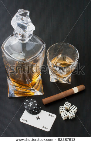 Whisky, cigar, dice and cards over black background - stock photo
