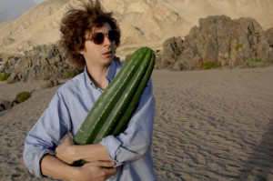Michael Cera holding a cactus