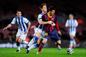 Lionel Messi Lionel Messi of FC Barcelona duels for the ball with
