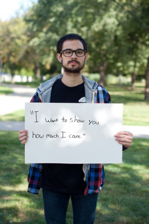 of sexual assault, photographing them holding a poster with a quote ...