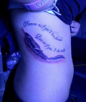 script with feather tattoo