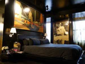 painting by David Piddock hangs above Cindy's bed, out-fitted in ...