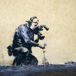 Banksys' art images are all over the internet... just google Banksy to ...