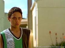 local school boy, whose father is often absent