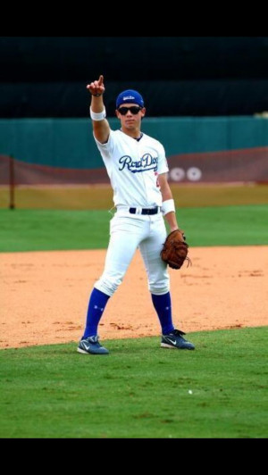 Nick Jonas playing baseball