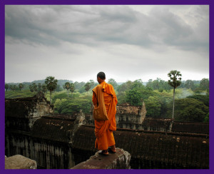 Angkor Wat Jungle Temple with Praying Monk by Ian Brewer