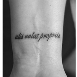 alis volat propriis - latin - she flies with her own wings